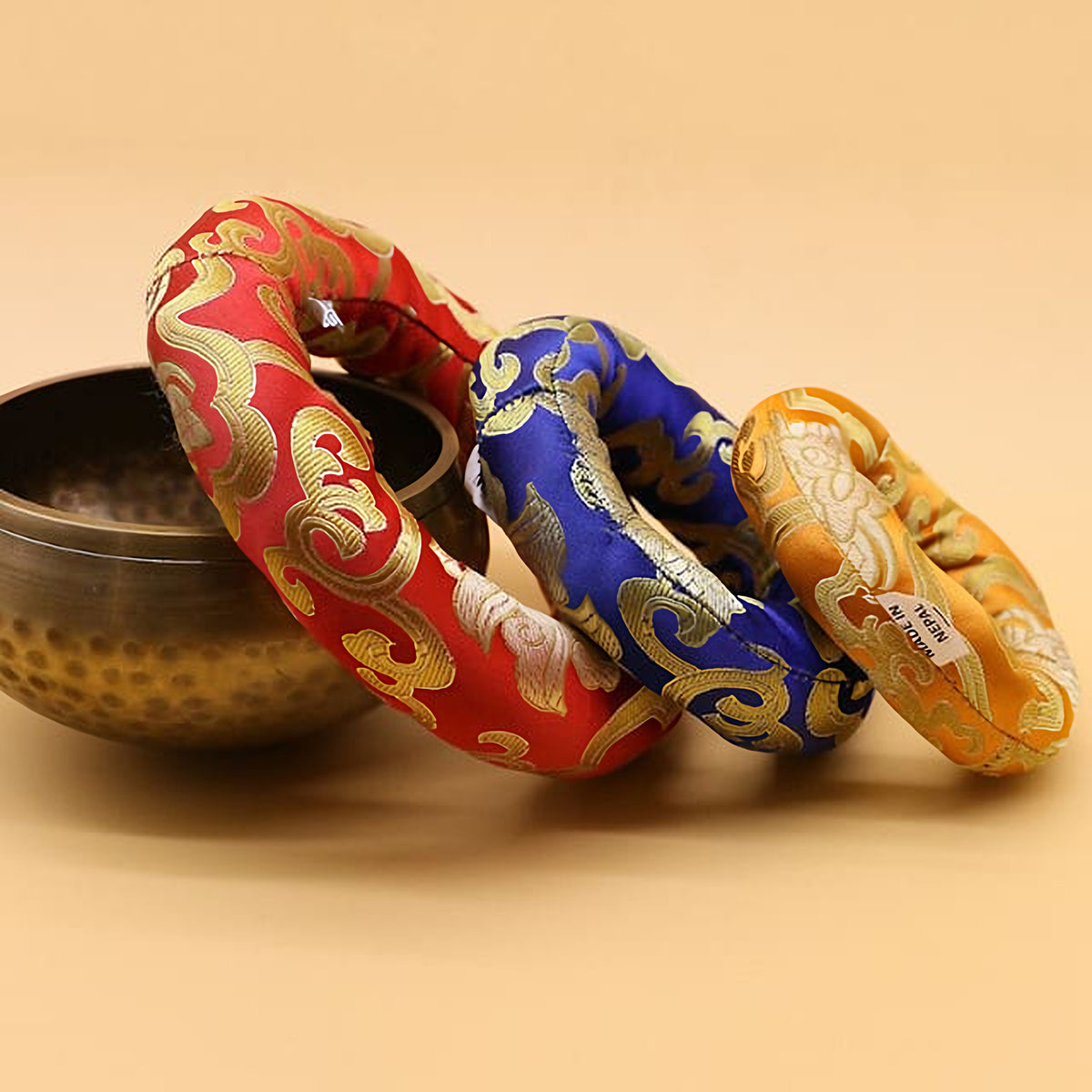 Singing bowl cushion with instrument