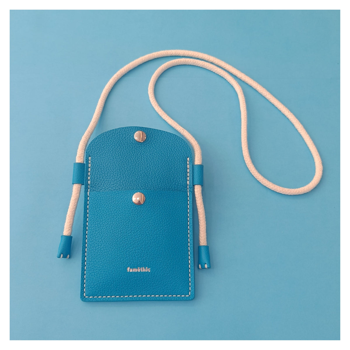 étui téléphone pochette papier voyage cuir turquoise collection marseille H2O faméthic maroquinerie