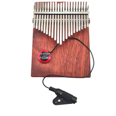 A pickup microphone installed on a kalimba