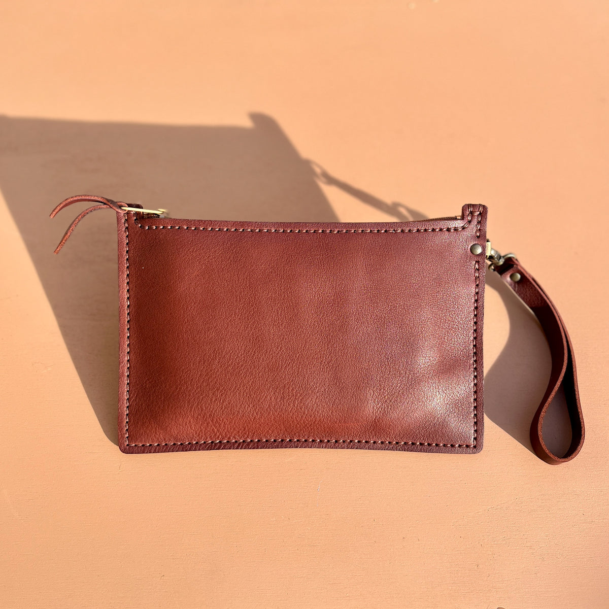 grande pochette zippée en cuir fabriqué en france maroquinerie d eluxe française faméthic