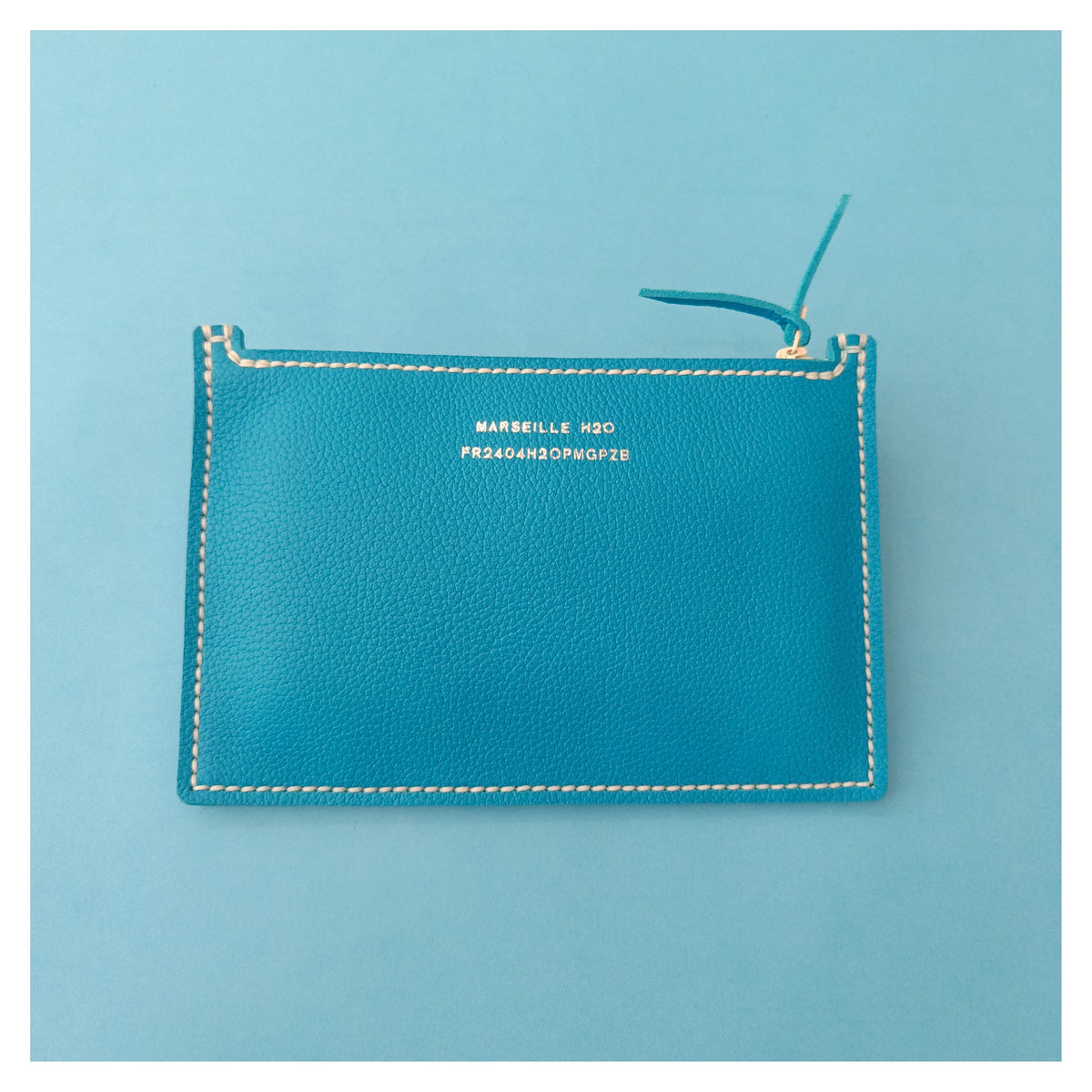 grande pochette zippée en cuir turquoise collection Marseille H2O faméthic maroquinerie
